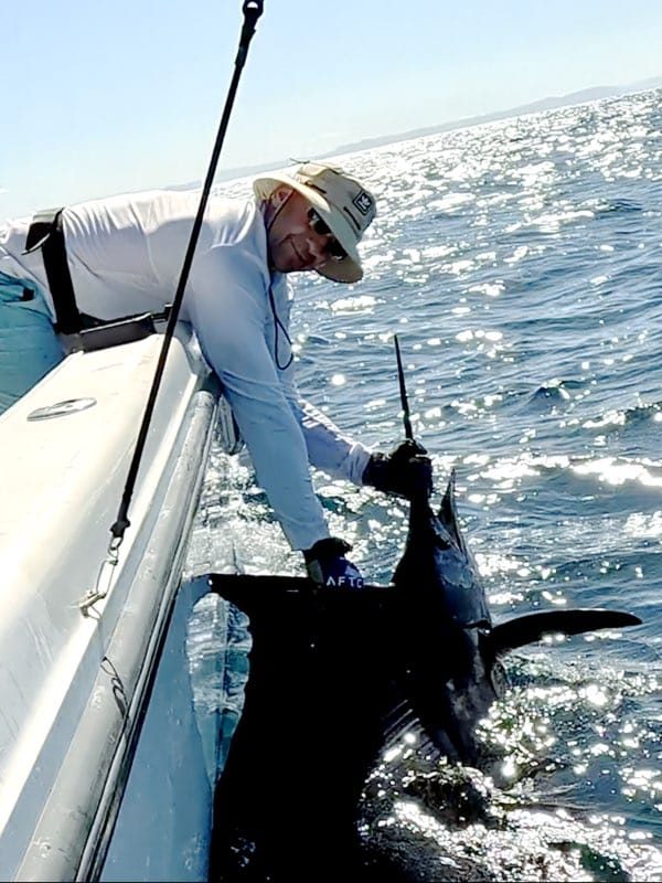 Sailfish alongside a boat off Costa Rica's Gold Coast